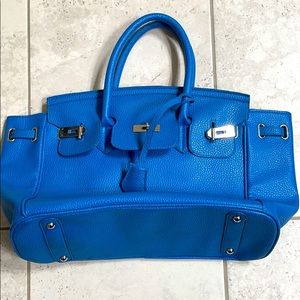 Bright blue purse similar to a Birkin Bag